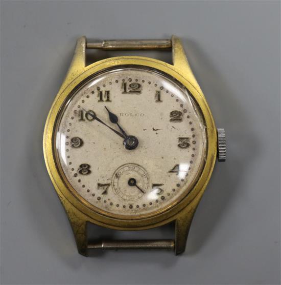 A gentlemans mid size gilt metal and steel Rolco manual wind wrist watch, no strap.